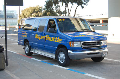 blue van shuttle phone number